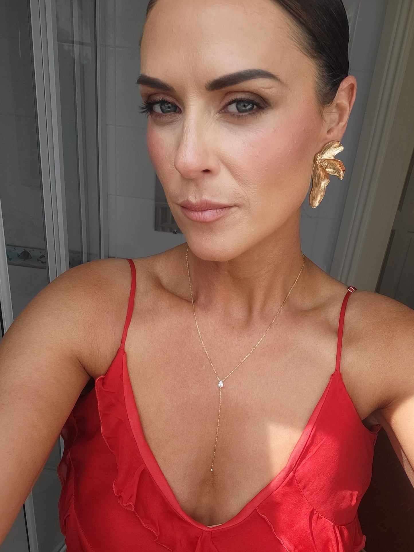 E V A Gold Statement Flower Earrings